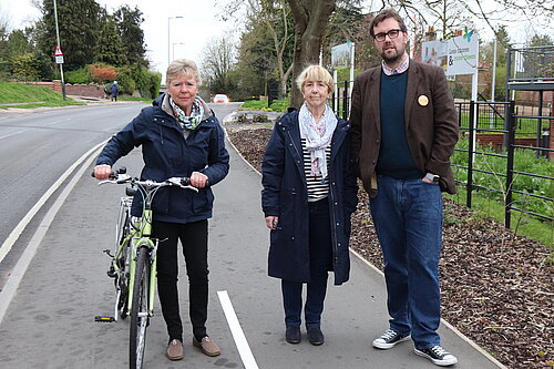 Cllrs Judith Lubbock, Caroline Ackroyd, James Wright, standing on the Bluebell Rd hybrid cycle path.